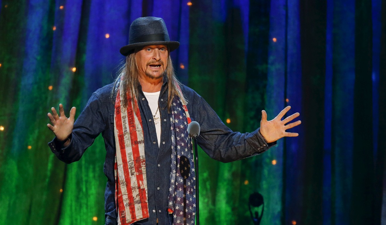 Kid Rock inducts rock band Cheap Trick into the Rock and Roll Hall of Fame at the Barclays Center in Brooklyn on April 8, 2016. Photo: Reuters