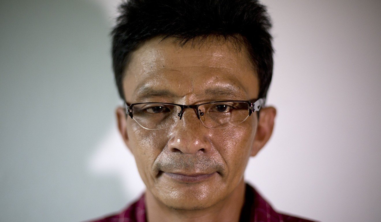 Samart Senasuk, 44, a former slave in a Thai fishing vessel, now helps other victims to overcome their trauma and get the compensation they are entitled to under Thai law. Photo: Antolin Avezuela