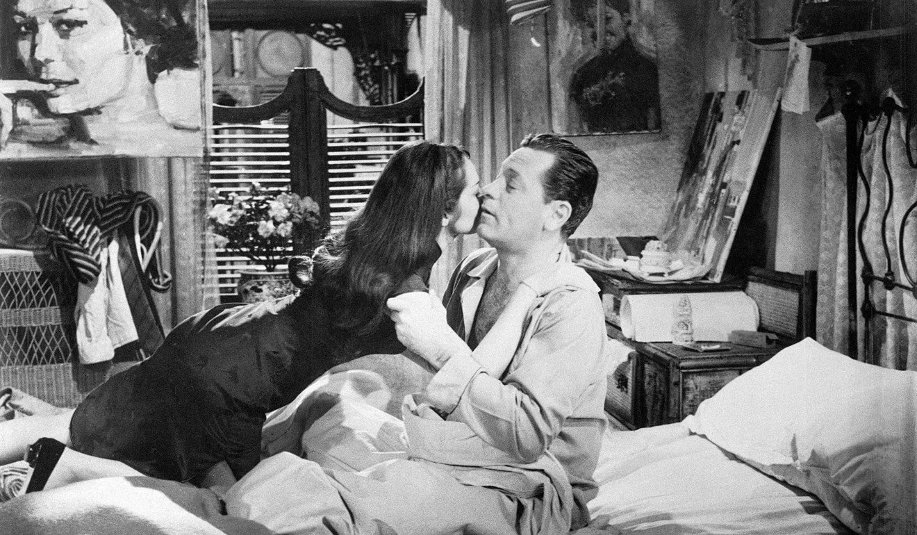 Nancy Kwan (as Suzie Wong) and William Holden (as Robert Lomax) share a moment in the 1960 film The World of Suzie Wong. Photo: Alamy