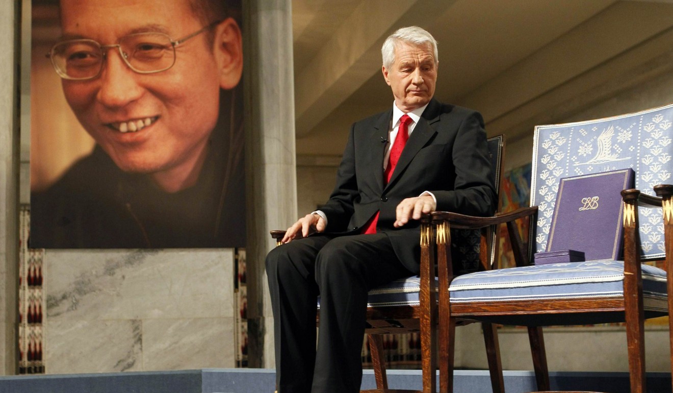 Norwegian Nobel Committee chairman Thorbjoern Jagland looks down at the vacant chair reserved for absent Nobel laureate Liu Xiaobo at the Nobel Peace Prize award ceremony in Oslo in December 2010. Photo: AFP