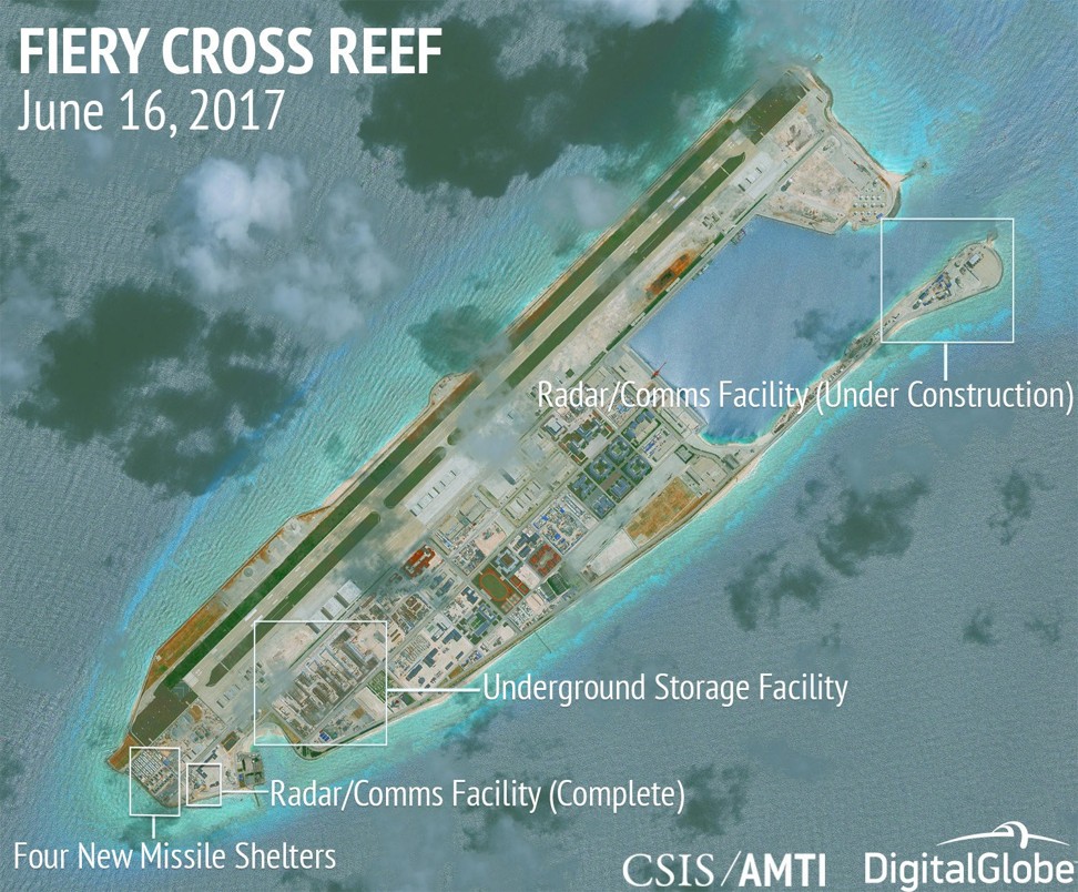 Construction is shown on Fiery Cross Reef, in the Spratly Islands of the South China Sea, in this June 16 satellite image released by CSIS Asia Maritime Transparency Initiative at the Centre for Strategic and International Studies. China has continued, over the past year, to make claims of sovereignty over the South China Sea features, while militarising several natural and artificial islands, despite prior assurances that it would not do so. Photo: CSIS / AMTI DigitalGlobe / Handout via Reuters