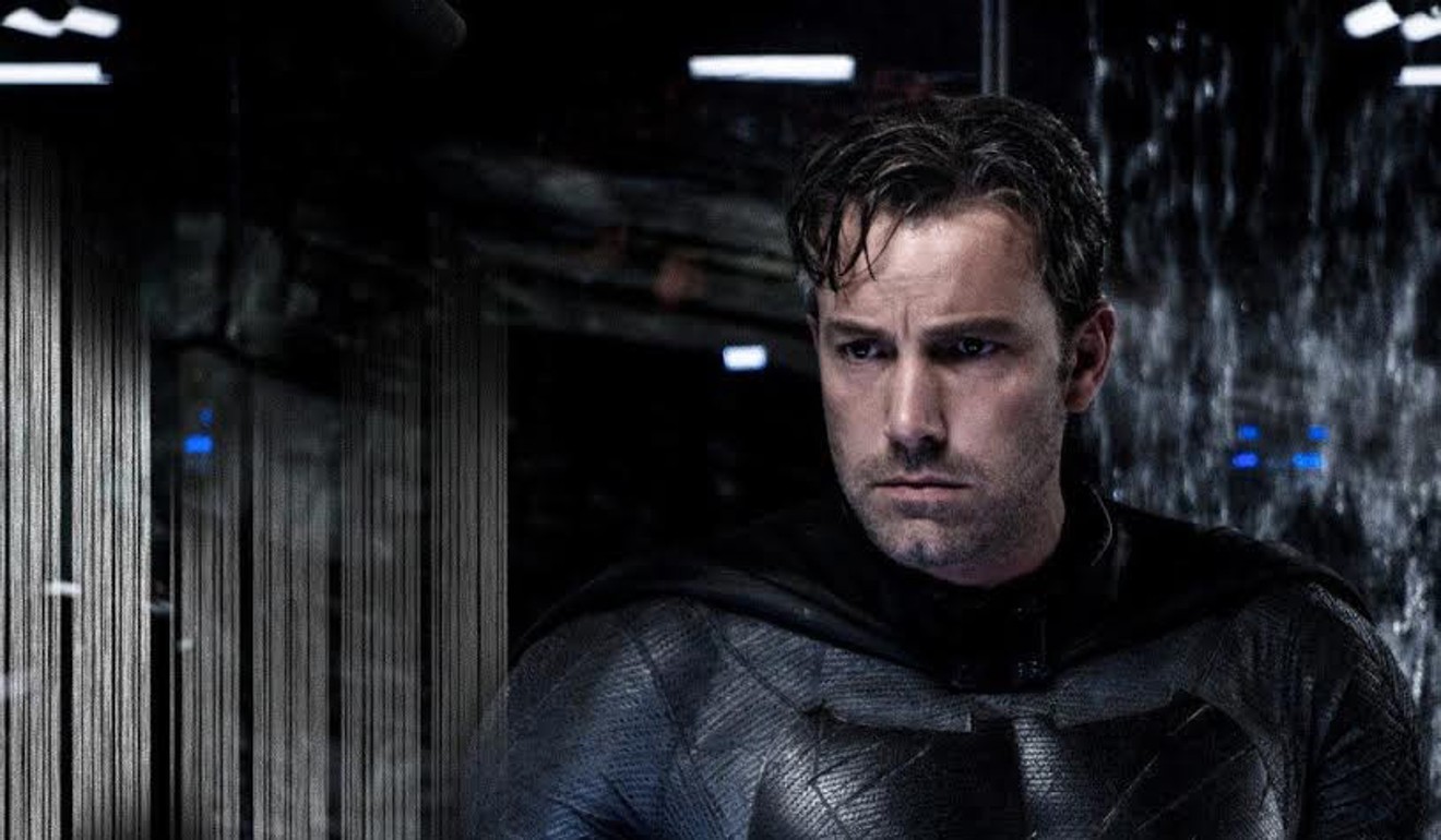 Ben Affleck plays an older, allegedly wiser Caped Crusader in Batman v Superman: Dawn of Justice. His script for a solo Batman movie has been dropped. Photo: Courtesy of Warner Bros./DC.