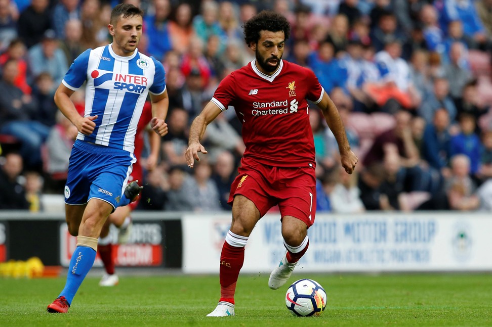 Liverpool’s Mohamed Salah (right) in action against Wigan Athletic last week. Photo: Reuters