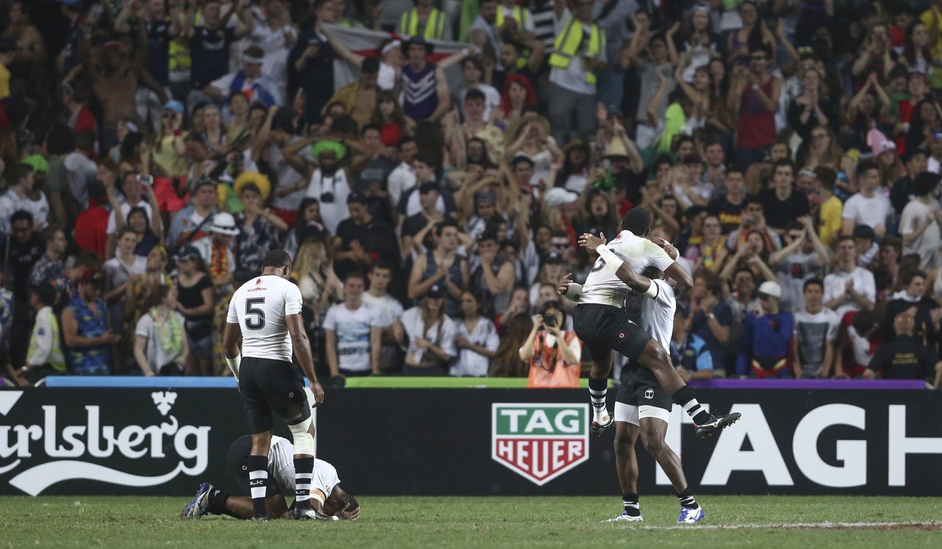 Fiji players celebrate their victory against South Africa at Hong Kong Stadium. Photo: Jonathan Wong