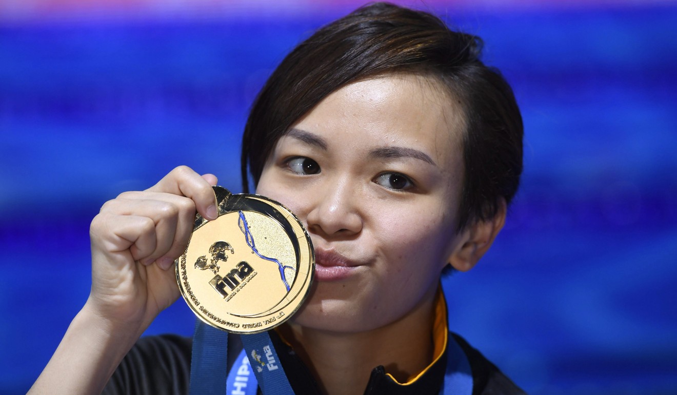 Cheong Jun Hoong of Malaysia poses with her gold medal.