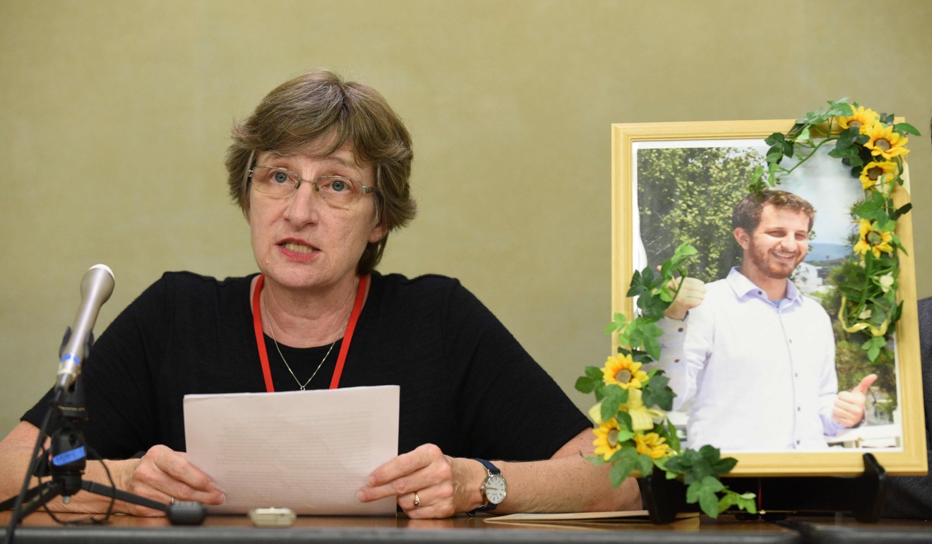 Martha Savage of New Zealand, mother of Kelly Savage, pictured at right who died while in a hospital psychiatric ward, speaks during a press conference at the Ministry of Health, Labour and Welfare in Tokyo. Photo: Reuters