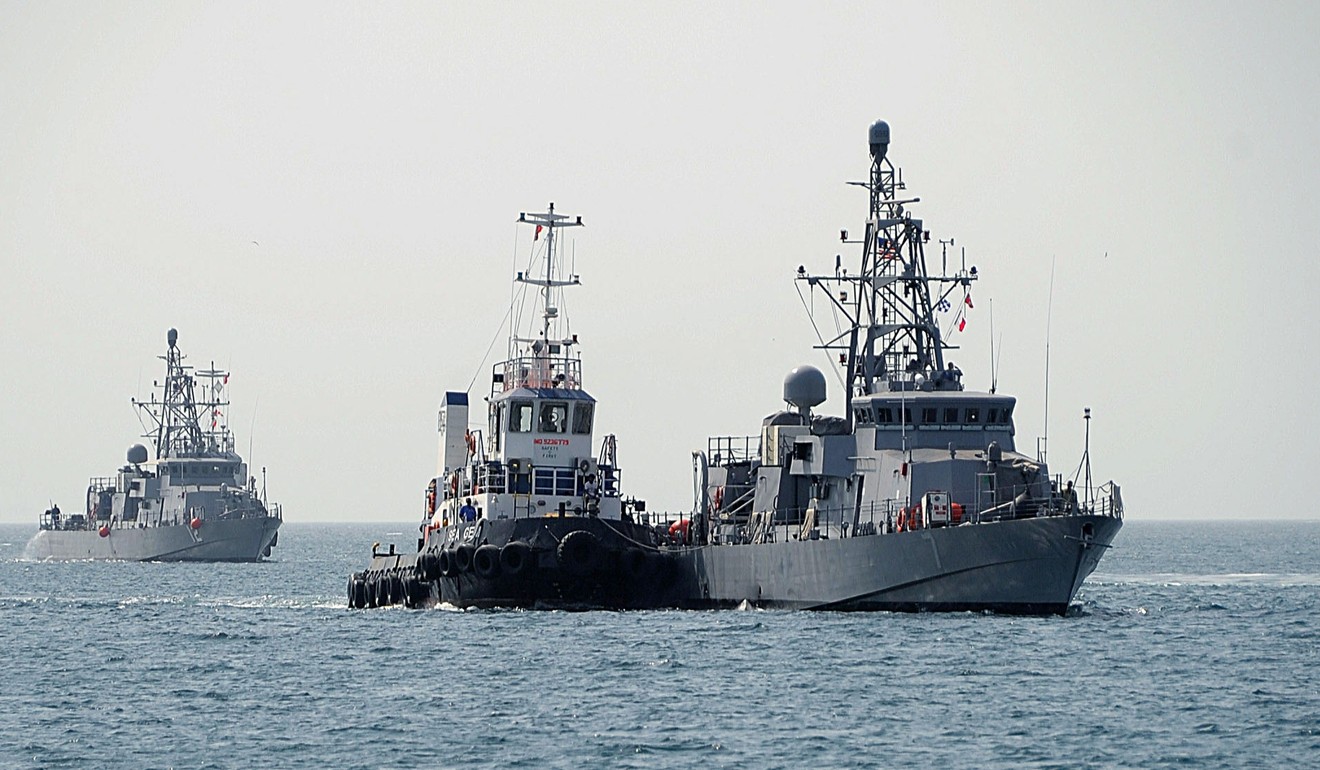 This file photo taken on August 16, 2010 shows the US patrol Coastal ships USS Thunderbolt (PC 12) (L)and USS Squall (PC 7) (R)as they transit from Khalifa Bin Salman Port to Mina Salman Pier near Bahrain. Photo: AFP