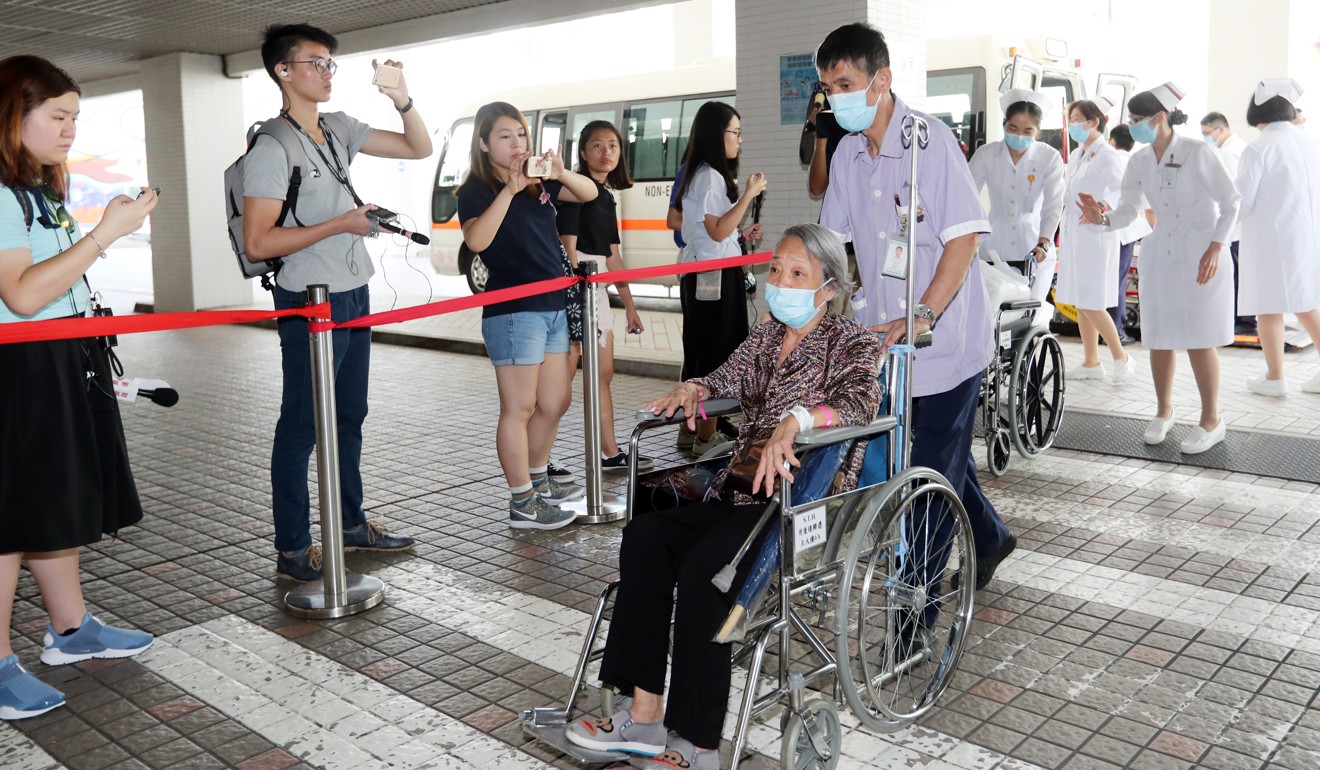 A transferred patient arrives at St Teresa's Hospital in Kowloon City. Photo: Edward Wong