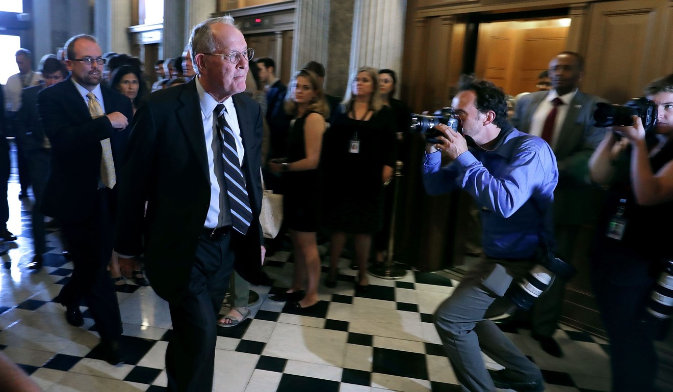 Senator Lamar Alexander walks to the US Senate Chamber for a vote to repeal and replace the Affordable Care Act, also known as Obamacare. Alexander was one of seven Republicans who joined with Democrats to vote down the attempt. Photo: AFP