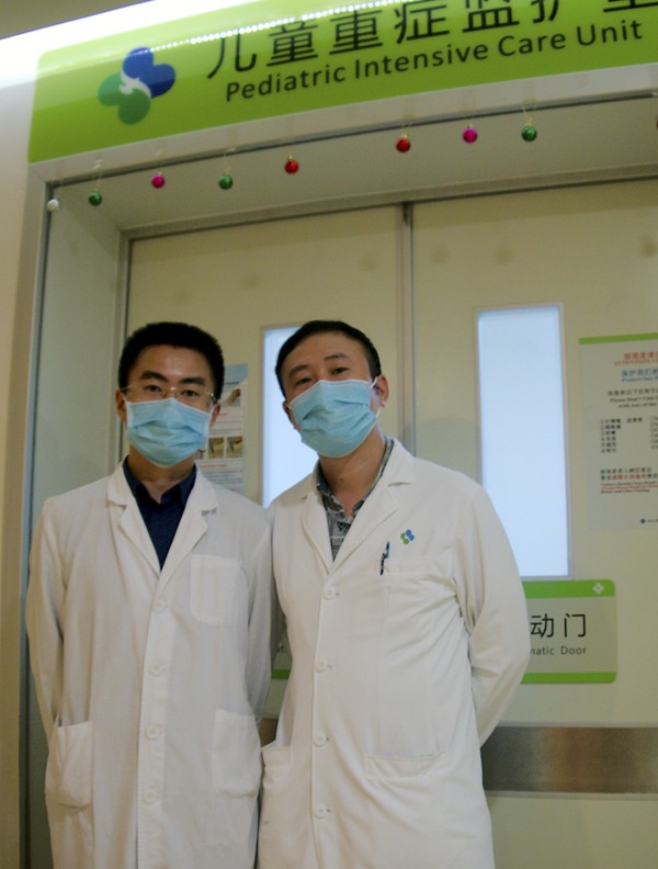 Dr Mao Huawei and Dr Liu Chenjing of the Shenzhen hospital’s paediatric intensive care unit. Picture: Stuart Heaver