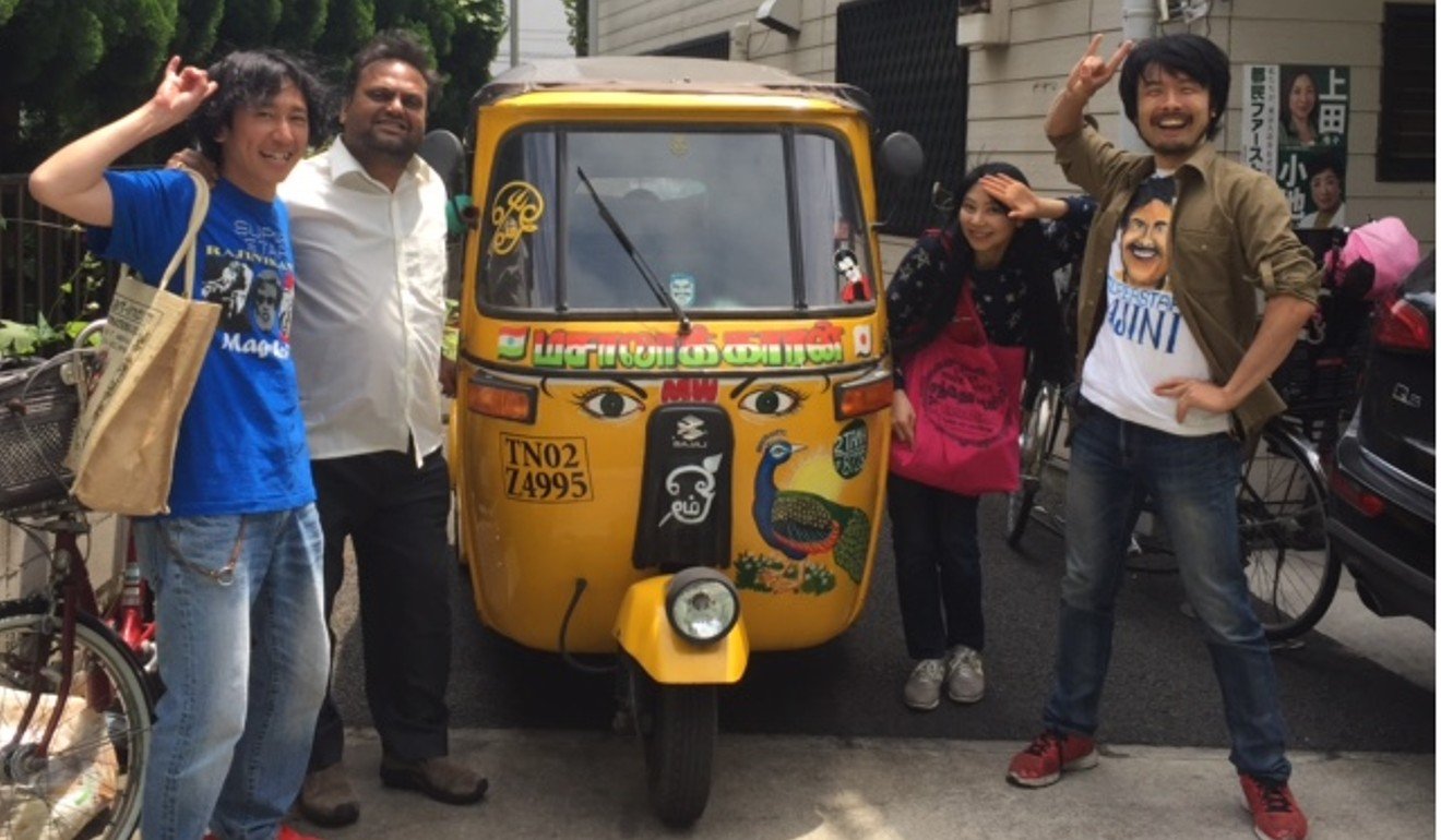Members of the Tokyo Rajinikanth fan club pose with a specially imported auto rickshaw from Chennai. Photo: Pallavi Aiyar
