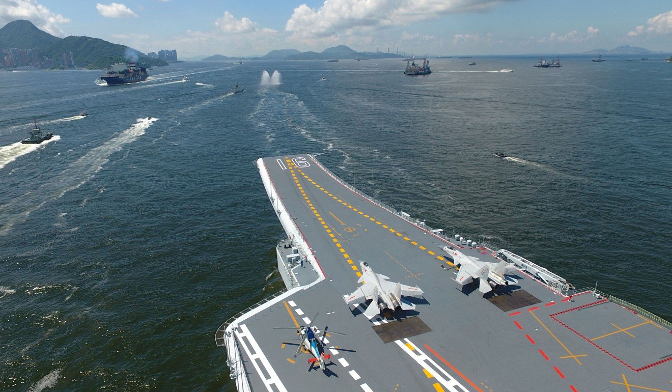 China's first aircraft carrier, the Liaoning, leaves after wrapping up a five-day visit to the Hong Kong. Photo: Xinhua