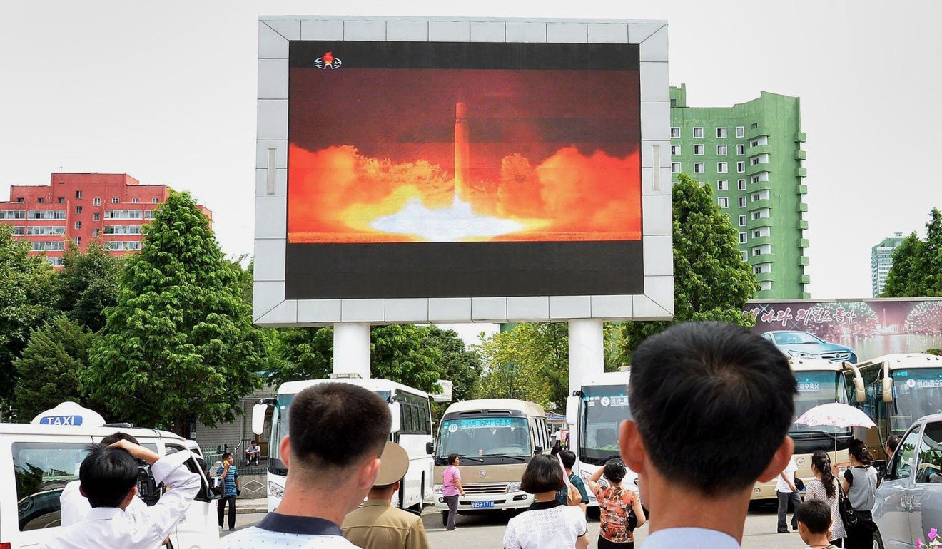 A large screen in Pyongyang shows news of North Korea's second ICBM launch. Photo: Kyodo