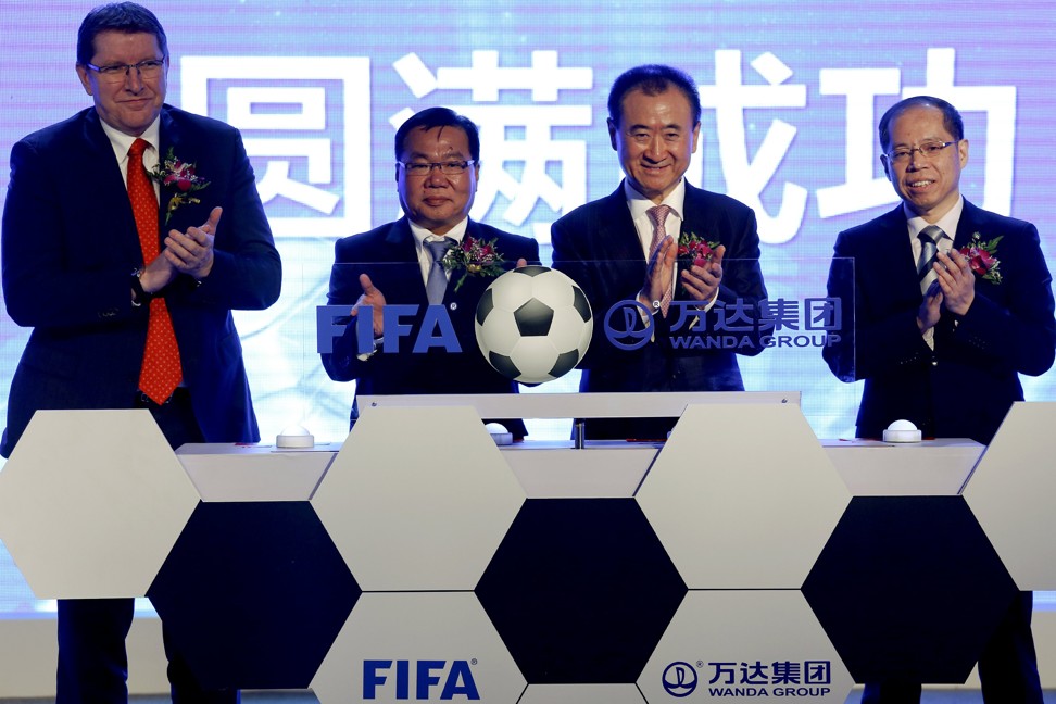 Zhang Jian (right) announcing strategic partnership between Wanda Group and Fifa in Beijing March 2016. Photo: Reuters
