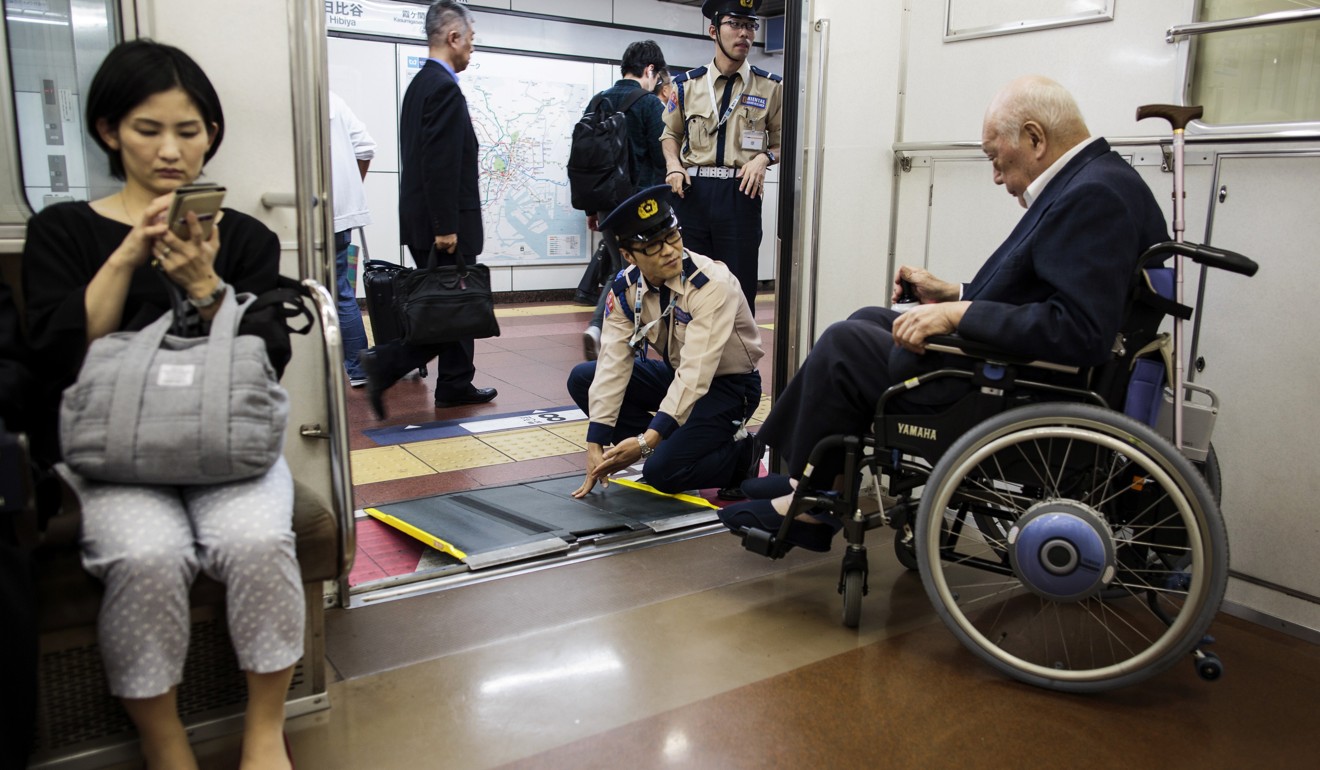 An elderly man disembarks from a train at a station in Tokyo. Japan’s ageing workforce mean it is ideally suited to embrace robots and artificial intellegence. Photo: AFP