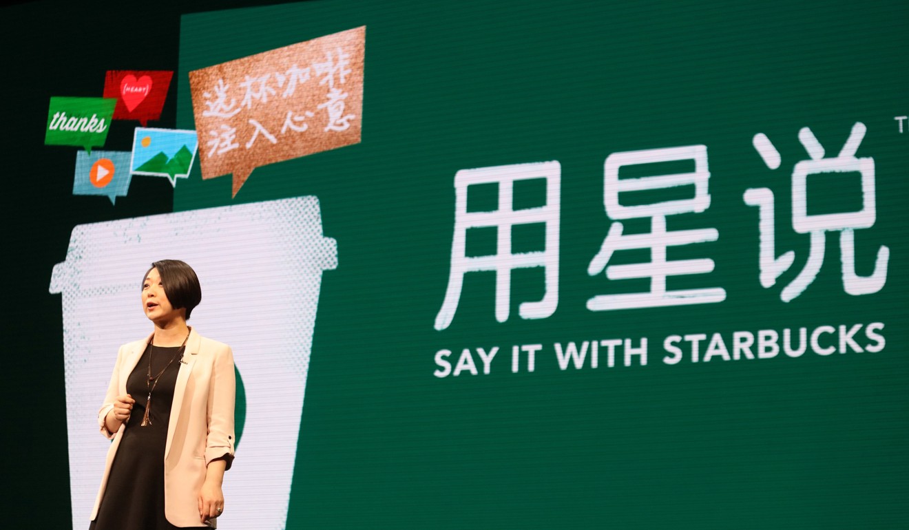 Molly Liu, vice-president of China Digital Ventures for Starbucks, speaks in at the Starbucks shareholders meeting in Seattle. Starbucks has now bought the remaining 50 per cent of its joint venture business in China for US$1.3 billion and has 2,800 stores now scattered across the country. Photo: TNS