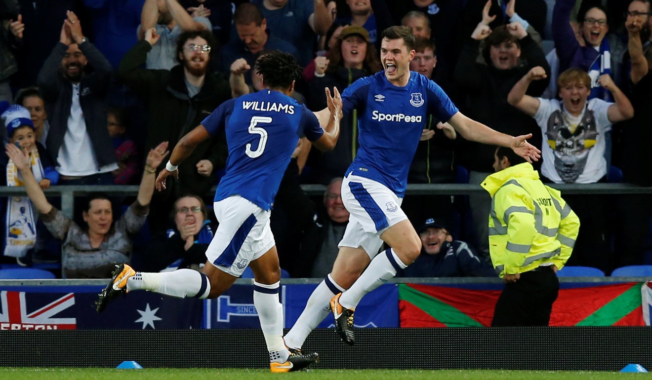 Everton's Michael Keane celebrates scoring with Ashley Williams. Photo: Reuters