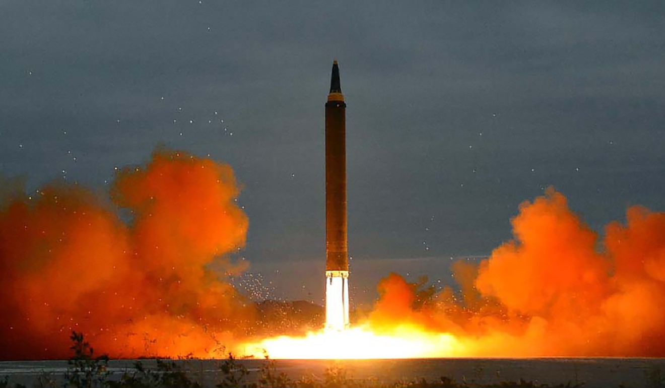 North Korea’s medium-range Hwasong-12 rocket lifting off. Photo: AFP
