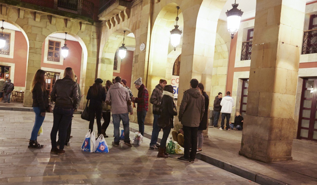 The Spanish tradition of botellón sees people gather in public places to socialise and drink. Photo: Alamy
