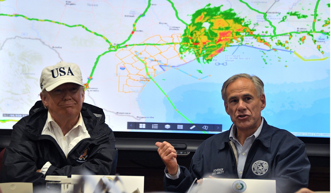 Texas Governor Greg Abbott and Trump at the Texas Department of Public Safety Emergency Operations Centre in Austin. Photo: AFP