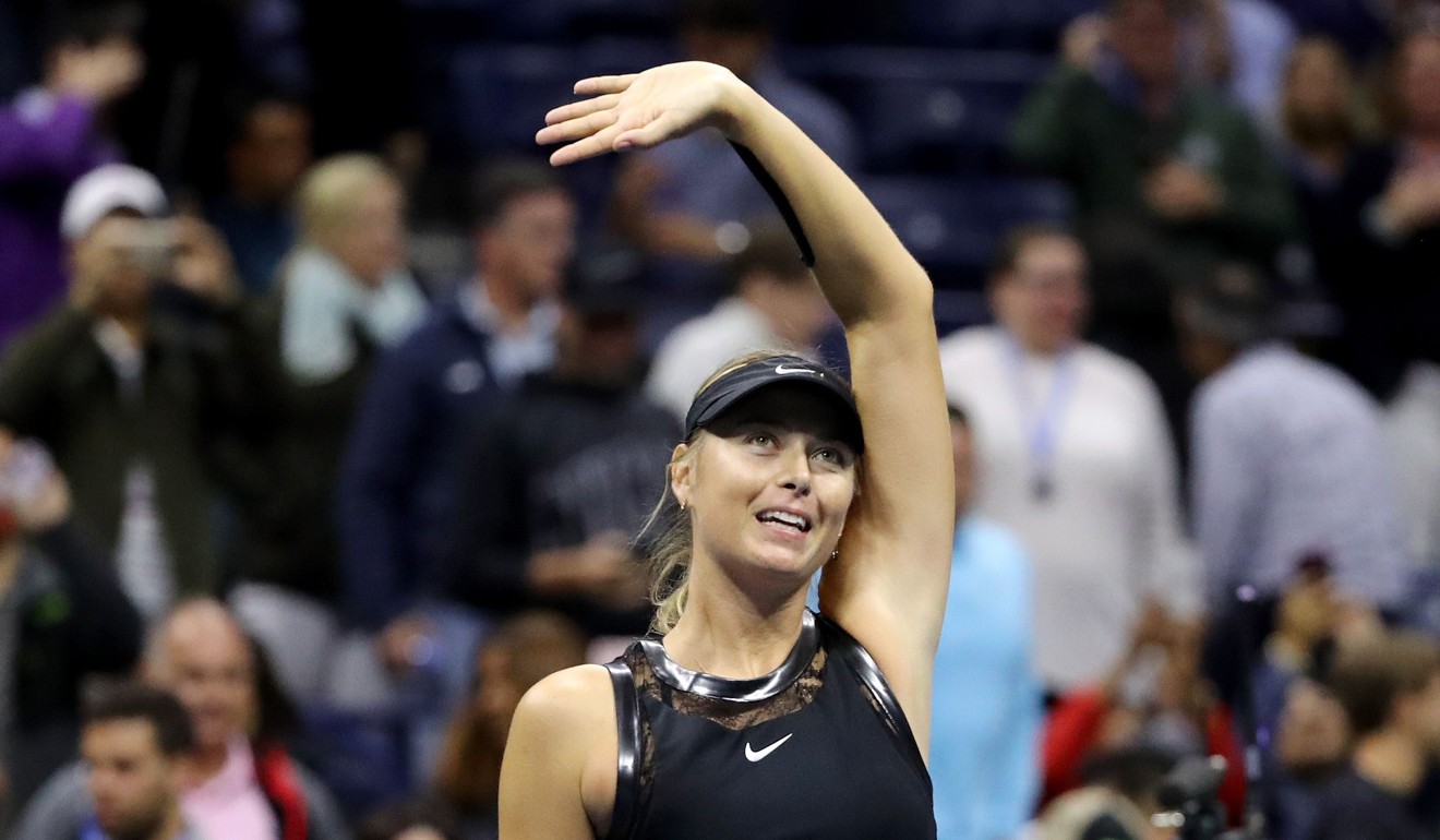 Maria Sharapova salutes the fans. Photo: AFP