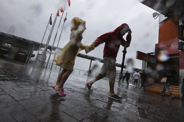 Images of Tsim Sha Tsui as Typhoon Pakhar hits Hong Kong on August 27. Photo: Felix Wong