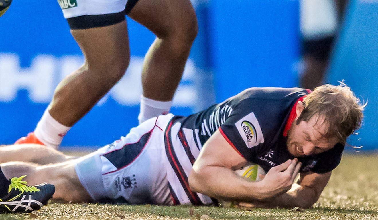 Hong Kong’s Toby Fenn finds the try line against Japan on the weekend. Photo: HKRU