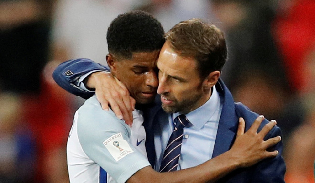 England’s Marcus Rashford hugs England manager Gareth Southgate as he is substituted off. Photo: Reuters