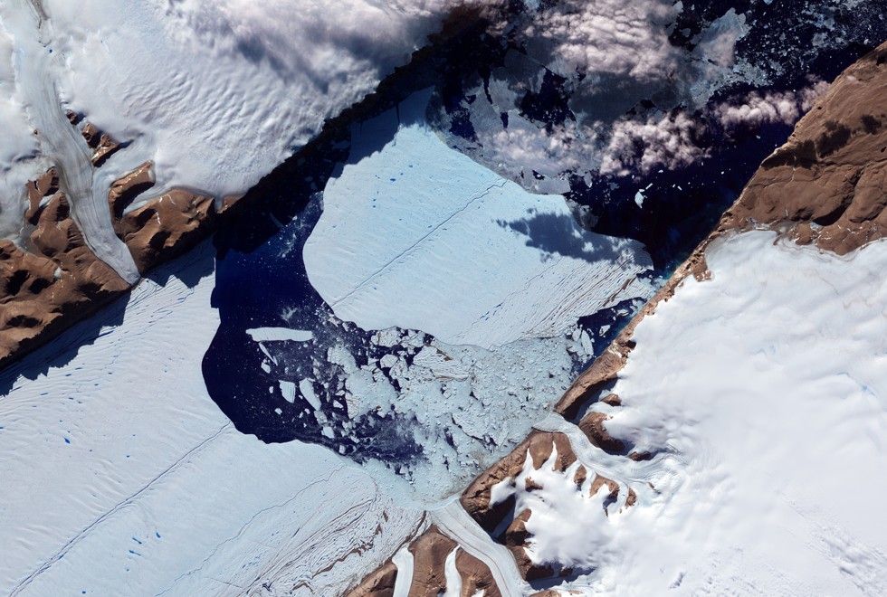 An image taken by the Nasa Earth Observatory in July 2012 shows a massive ice island broken free of the Petermann Glacier, in Greenland. Picture: AFP