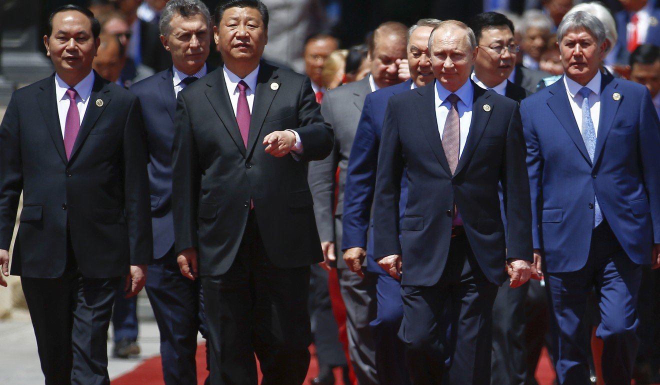 President Xi Jinping leads the way as Russian President Vladimir Putin and other world leaders arrive for a photo session during the Belt and Road Forum in Beijing, on May 15. Photo: AFP