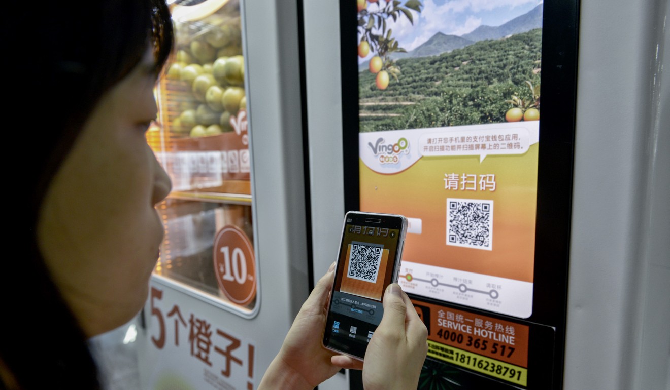 A vending machine with a QR code payment system.