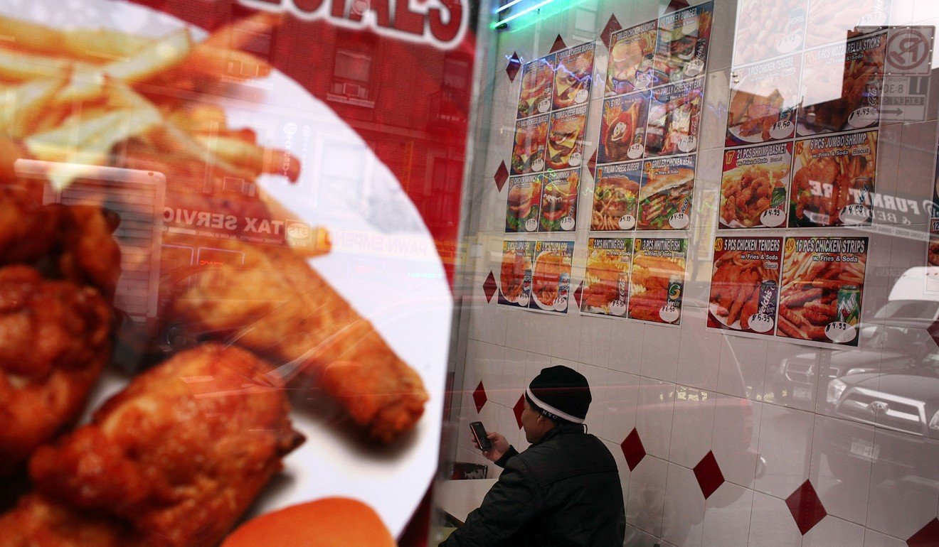 A fast-food restaurant in New York’s Bronx borough – rated the least healthy place in New York state in 2010, with more than 60 per cent of residents obese or overweight. Residents pointed to a lack of affordable fresh produce and the proliferation of such restaurants. Photo: AFP