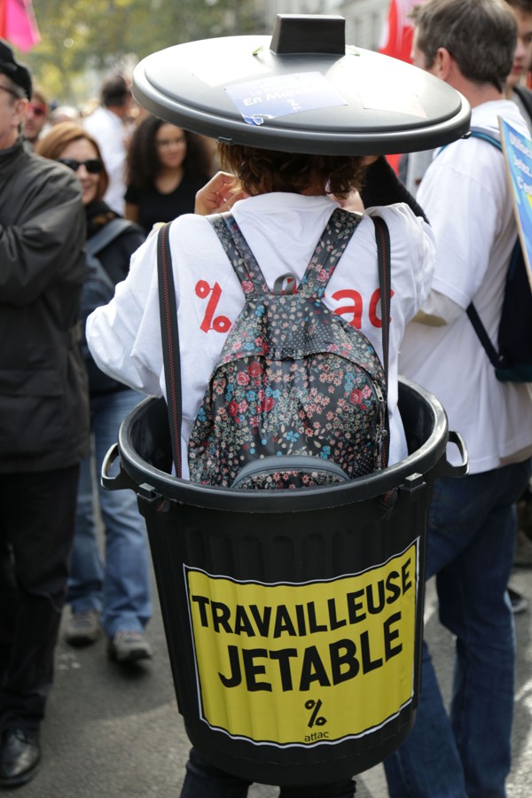 A demonstrator is dressed as a bin with a sign reading “Disposable worker” during protests against the government’s labour reforms, which were signed into law by French President Emmanuel Macron a day earlier. Photo: AFP
