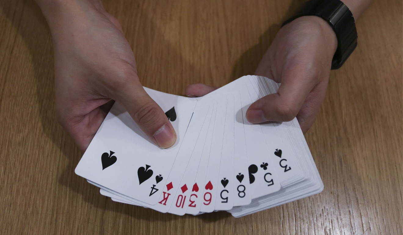 Fong can memorise a deck of cards in a minute. Photo: Jonathan Wong