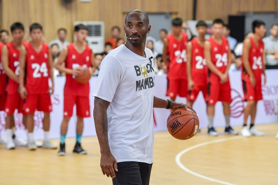 Bryant holds a basketball clinic in Haikou. Photo: AFP