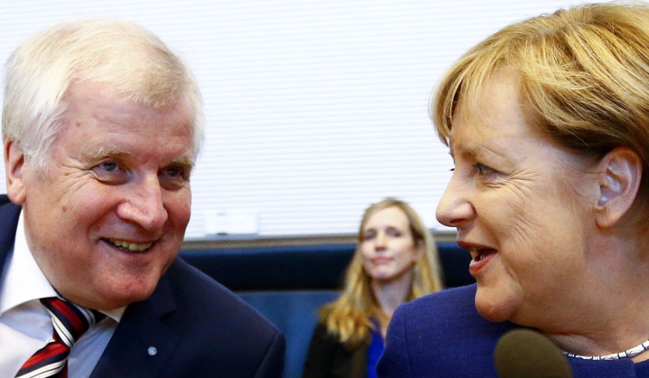 German Chancellor Angela Merkel, leader of the Christian Democratic Union Party (CDU) and Horst Seehofer, head of the CSU and Bavarian premier attend their first parliamentary meeting after the general election in Berlin. Photo: Reuters