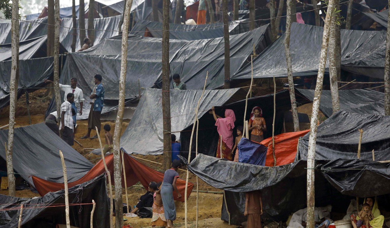 Rohingya refugees are facing water shortages and a high risk of disease with not enough toilets being built to cater the more than 400,000 who have so far flooded over the border from Myanmar's Rakhine state. Photo: AFP