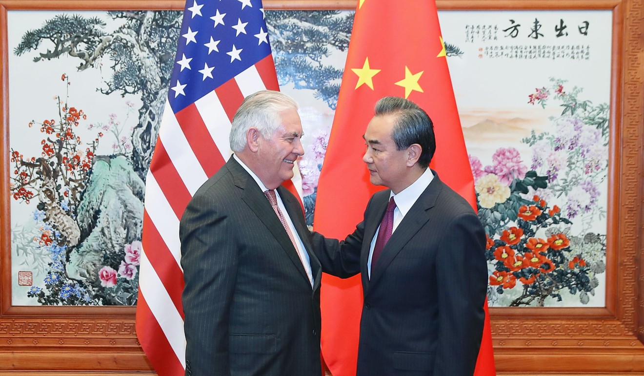 US Secretary of State Rex Tillerson (left) and Chinese Foreign Minister Wang Yi meet in Beijing on Saturday. Photo: Kyodo