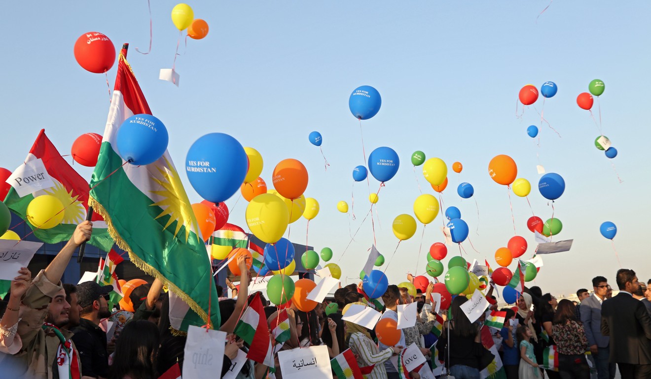 People hold balloons to protest against the flight ban that the Iraqi government imposed in the Kurish region following a non-binding independence referendum, which has been strongly rejected by Iraq's central government and neighbouring countries with Kurdish minorities. Photo: EPA