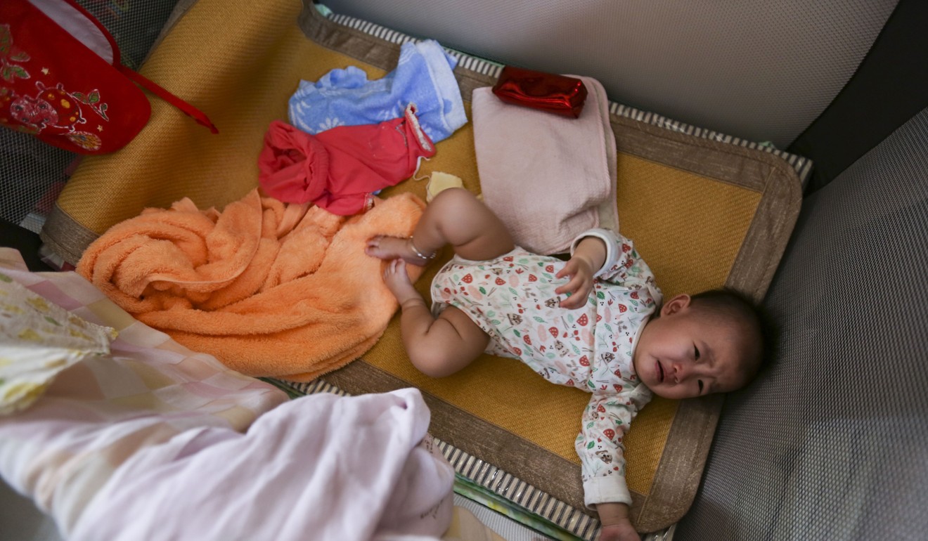 Yuen lives with her husband, her eight-month-old daughter, and her mother-in-law and brother-in-law who sleep on their living room sofa. Photo: Xiaomei Chen