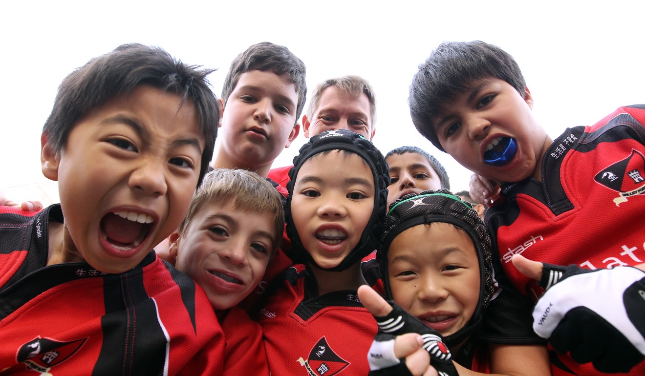 Hong Kong rugby kids pose at the Sevens. Photo: Nora Tam