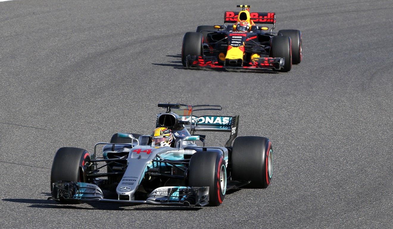 Mercedes’ driver Lewis Hamilton leads Red Bull’s Max Verstappen.