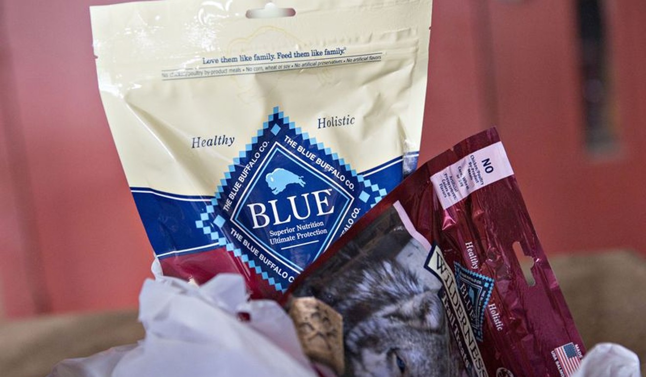Bags of Blue Buffalo Blue Health Bars and Wilderness Trail Treats.