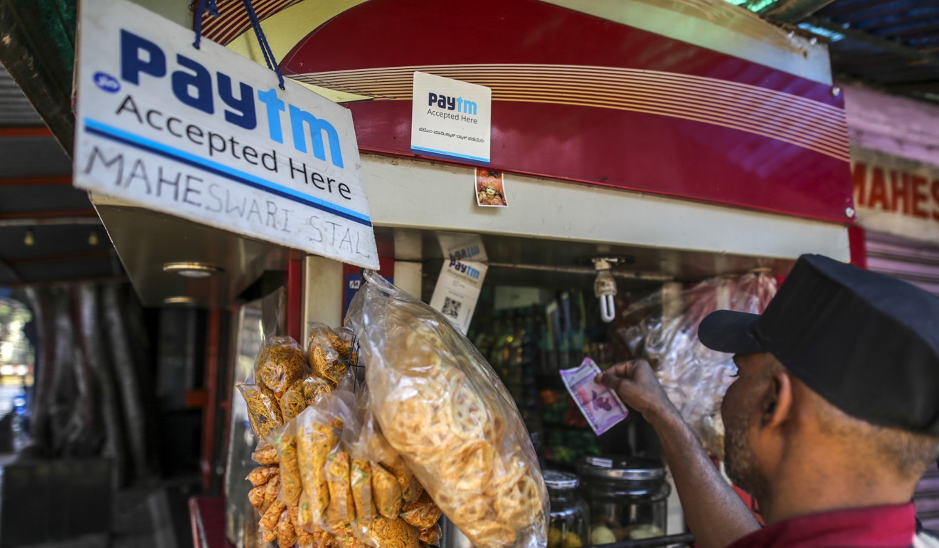 A PayTM sign is displayed at a snack stall in Bangalore, India. Picture: Bloomberg