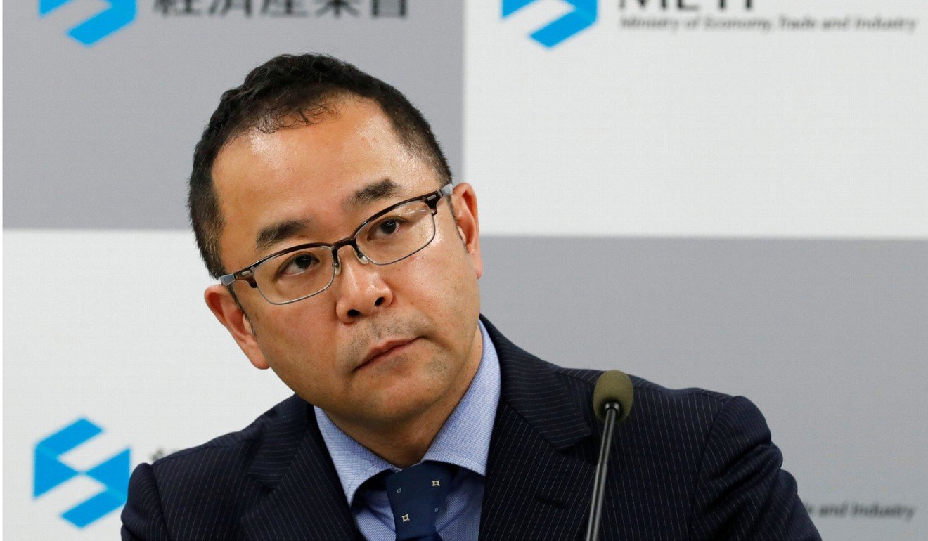 Ministry of Economy, Trade and Industry 's director of metal industries division Yasuji Komiyama addresses media on the growing Kobe Steel scandal. Photo: Reuters