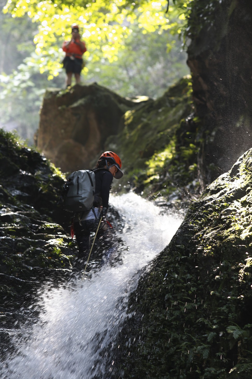 Huot abseils down a waterfall in the New Territories. Photo: James Wendlinger