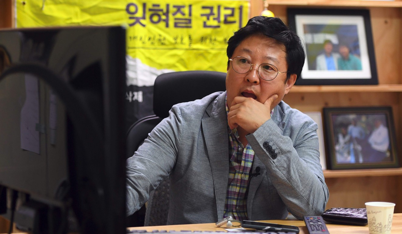 Kim Ho-jin, CEO of Santa Cruise “digital laundry” company, checking a computer screen for “revenge porn” at his office in Seoul. Photo: AFP