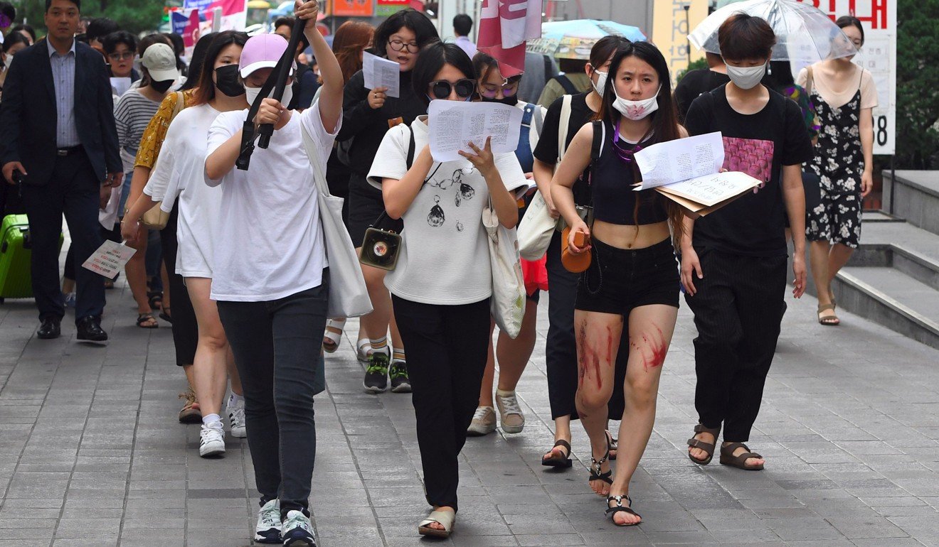 South Korean women at a protest to urge tech giants including Google, YouTube, Facebook and Twitter to work harder to curb online sex crimes in Seoul. Photo: AFP