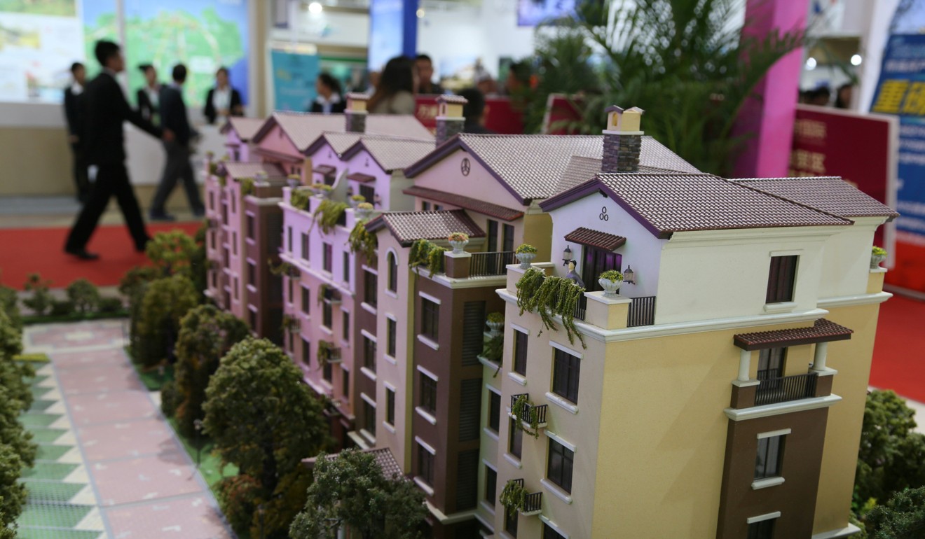 Models of residential buildings at an overseas property exhibition in Beijing in April. Investorist founder Jon Ellis sees growing demand among Chinese buyers for homes overseas, for educational and lifestyle purposes. Photo: Reuters