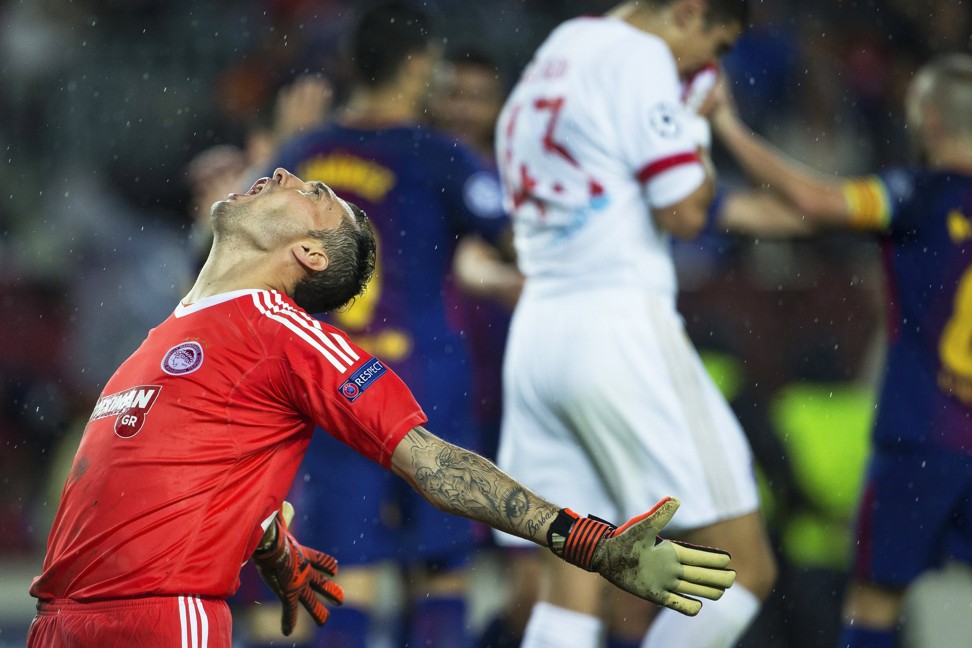 Olympiacos goalkeeper Silvio Proto reacts during the Uefa Champions League win. Photo: EPA